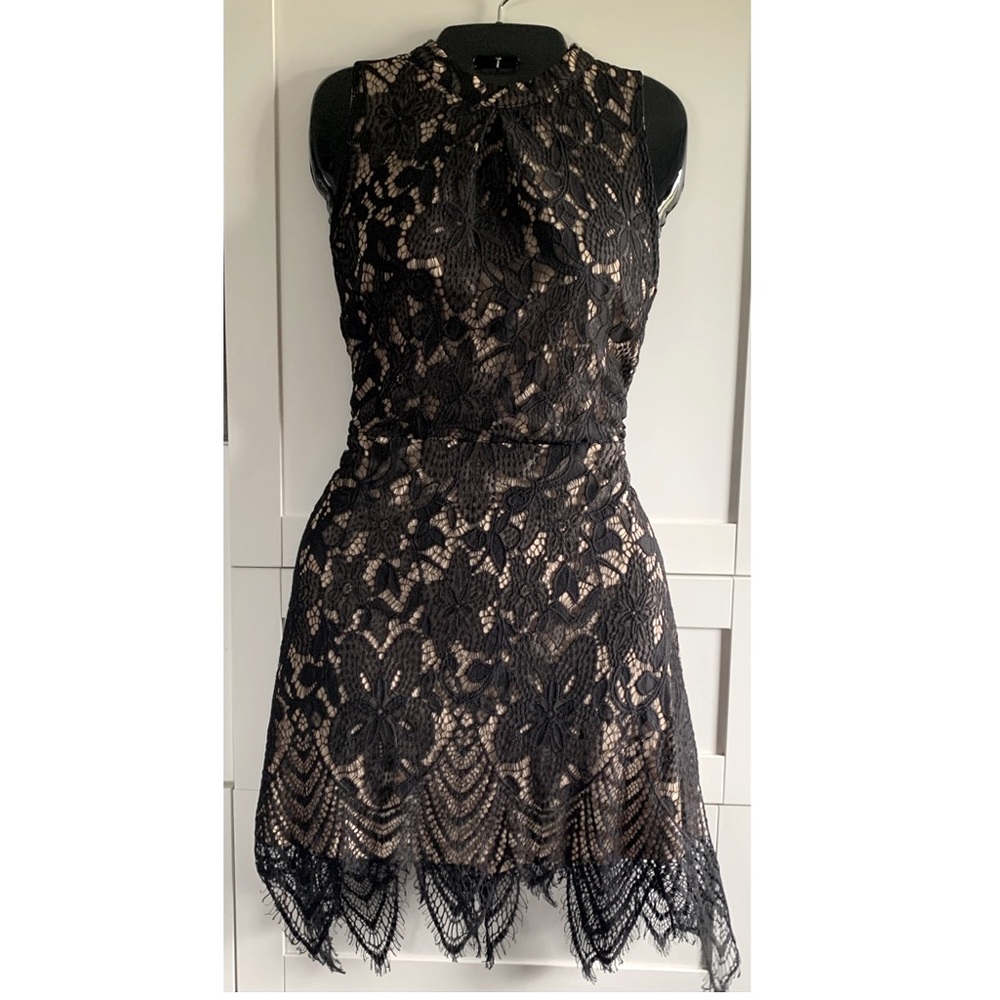 Black lace dress with nude lining